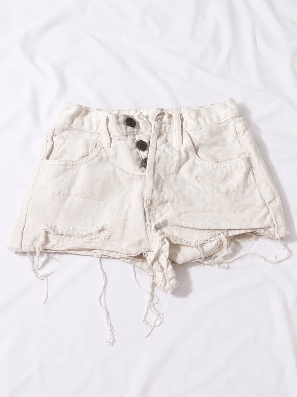 Brandy Melville Cream Distressed Denim Shorts